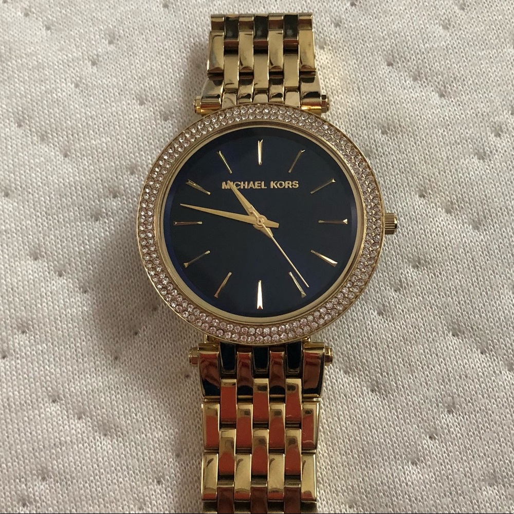 Gold plated navy face Michael Kors watch